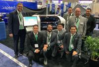Mark Brawley with members of the Quiptech team at the recent APEX Expo.